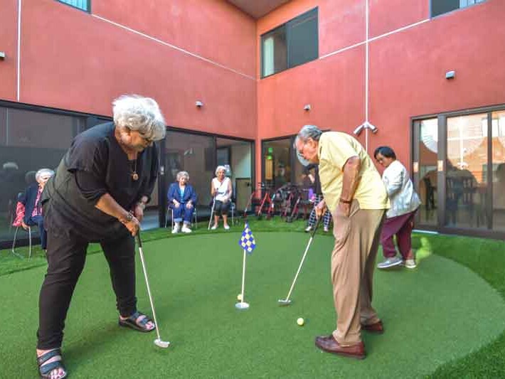 Seniors playing golf at Avant Garde